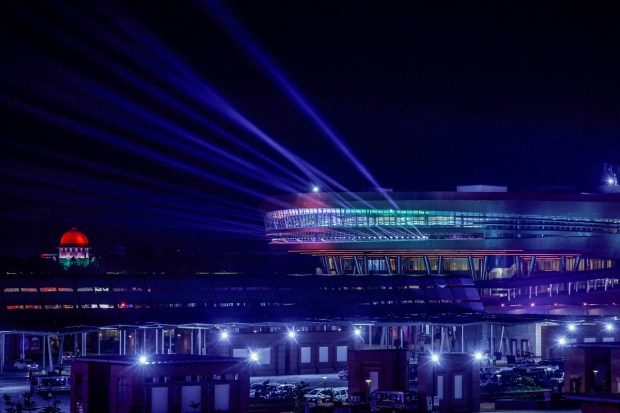 The newly built international convention and exhibition centre and its verdant lawns dazzled at night with colourful illumination while its gurgling fountains. (PTI Photo)