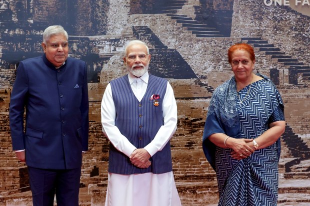 Vice President Jagdeep Dhankhar and his wife Sudesh Dhankhar being welcomed by Prime Minister Narendra Modi upon his arrival at the Bharat Mandapam. (PTI Photo)