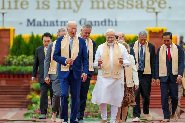 Amidst a rainy Sunday morning, prior to the final session of the 'One Future'-themed G20 Summit, global leaders gathered at Raj Ghat to pay their respects to Mahatma Gandhi. (Image/PTI)