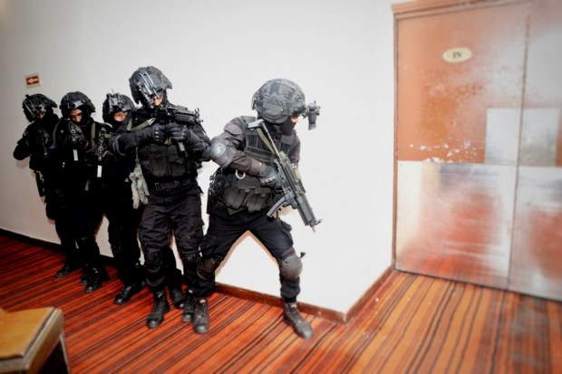  National Security Guard (NSG) personnel during a security drill ahead of the G20 Summit. (Image: PTI)