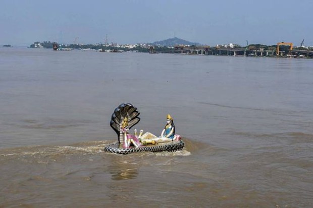 The total population affected due to floods increased to 4,03,313 in 19 districts as against the previous day's 3,40,937 in 22 districts. (Image: PTI)