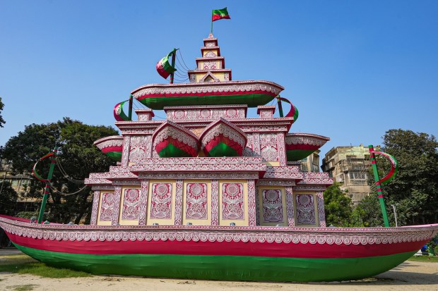 A community puja pandal is made in the colours of the football club Mohun Bagan at a park which is considered as the birthplace of the club, on ‘Shashti’ during the Durga Puja festival, in Kolkata. (PTI Photo)