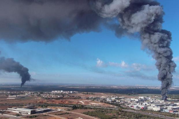 Smoke is seen in the Rehovot area as rockets are launched from the Gaza Strip, in Israel. (Image/Reuters)