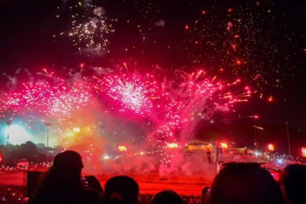 People watch fireworks show during Dussehra celebration at Morhabadi ground in Ranchi. (Photo: PTI)