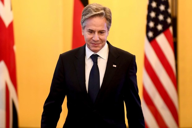 U.S. Secretary of State Antony Blinken takes his seat to attend session 1 of the G7 Foreign Ministers' meeting at the Foreign Ministry's Iikura guesthouse in Tokyo. (AP Photo)
