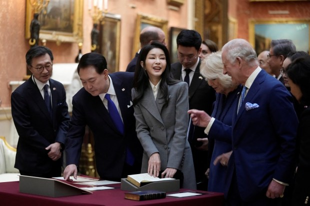 King Charles III invited The President and the First Lady to view a special exhibition in the Picture Gallery of items from the Royal Collection relating to the Republic of Korea. (Reuters Photo)