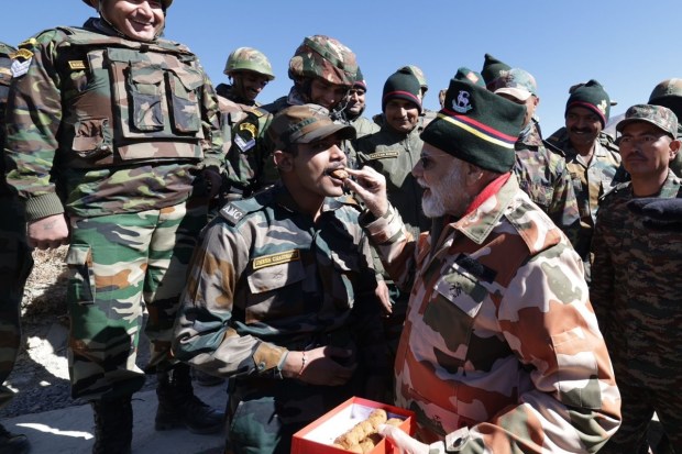 The prime minister shared photographs of his interactions with the soldiers in which he is seen offering sweets to them. (PTI Photo)