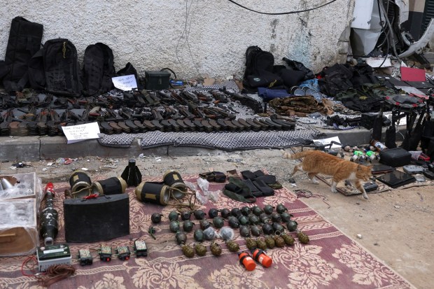 On Wednesday, Israeli soldiers showed the foreign journalists weaponry they said they found at Shifa, including dozens of AK-47 assault rifles, 20 grenades and several drones. (Reuters Photo)