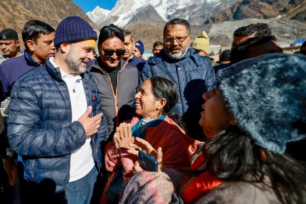 Gandhi interacted with the pilgrims and got photographed with them. He also visited Baba Bhairavnath temple and offered prayers.(PTI Photo)