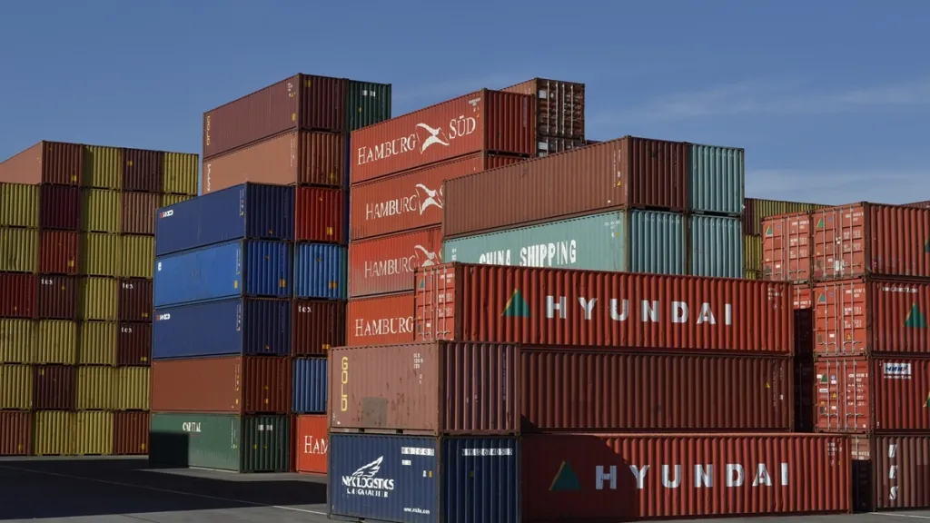 logistics, government reforms, government initiatives, Make in India, infrastructure spending, National Integrated Logistic Policy, emission norms, PLI schemes, manufacturing, e-commerce sector, GST, compliance
