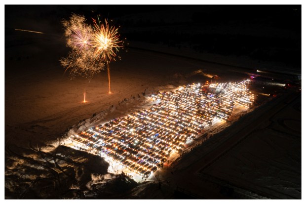 A festive spirit engulfs Krasnoyarsk, Russia, as participants attempt a Russian record by parking around 800 vehicles to form a Christmas tree during a lively flashmob on December 23, 2023. (Image: Reuters)