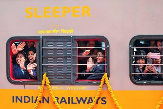 People cheer during the flag-off ceremony of Amrit Bharat train and inauguration of the redeveloped Ayodhya Dham Station on December 30. (Image: PTI)