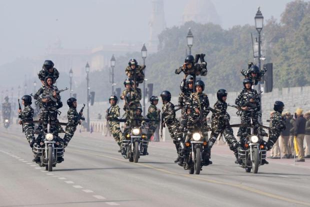 BSF women Dare Devils' team Seema Bhawani performs during a rehearsal for the Republic Day Parade 2024 at the Kartavya Path, in New Delhi on Thursday. (Image: PTI)