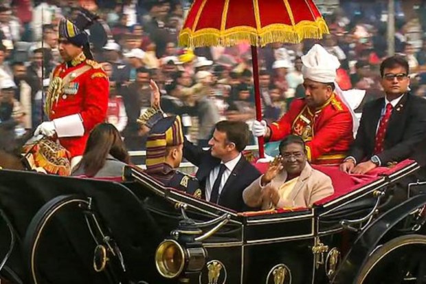 President Droupadi Murmu, with chief guest French President Emmanuel Macron, arrives for the 75th Republic Day function at the Kartavya Path on January 26. (Image: PTI)