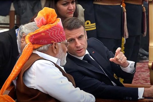 PM Modi and Macron interact during the Republic Day celebrations. (Image: PTI)