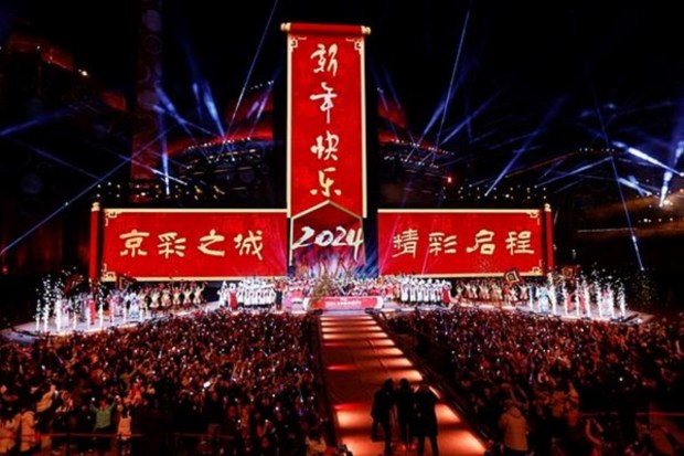 Artists react during the New Year's eve celebration at the Shougang Park in Beijing, China. (Reuters)