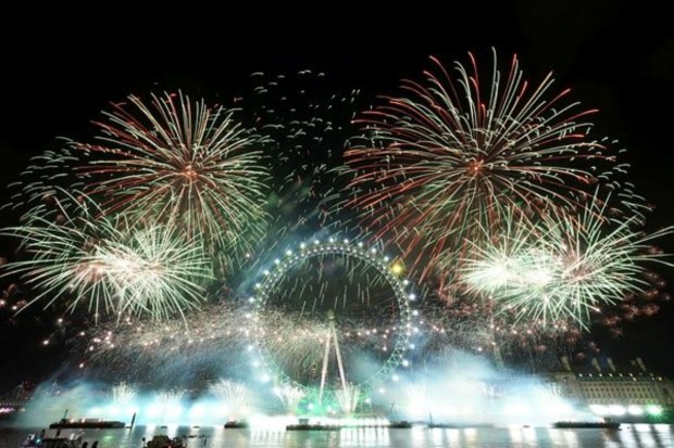 Fireworks explode over the London Eye Ferris wheel as Britons across the country welcome the New Year in London on January 1. (Reuters)
