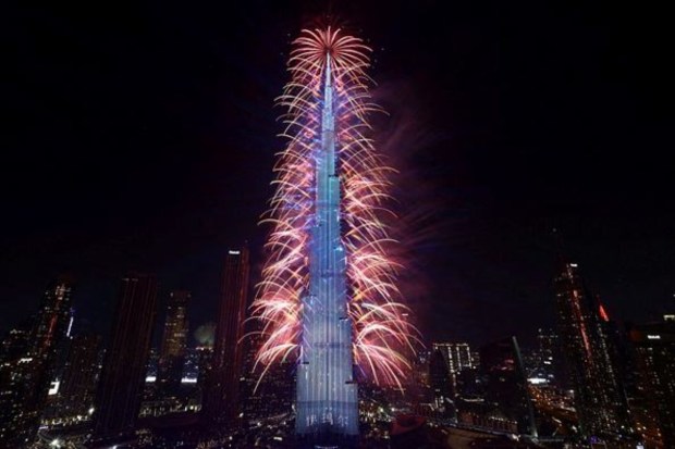 Fireworks explode from the Burj Khalifa, the tallest building in the world, during the New Year's celebrations in Dubai. (Reuters)