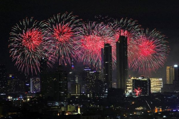 Fireworks explode during the New Year celebrations in Bangkok on January 1. (Reuters)