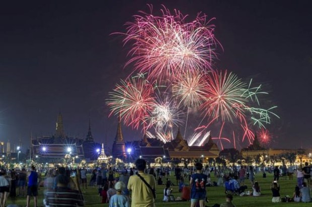Fireworks explode over the Grand Palace during the New Year celebrations in Bnagkok. (Reuters)