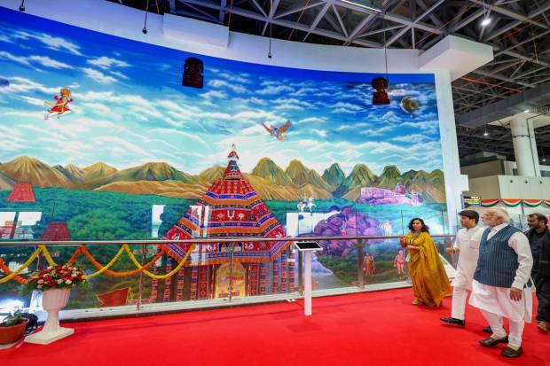 Prime Minister Narendra Modi with Union Civil Aviation Minister Jyotiraditya Scindia during a walkthrough of the new terminal building at Tiruchirappalli International Airport. (PTI Photo)