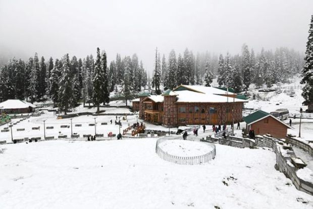 Gulmarg receives a blanket of fresh snowfall, bringing a touch of winter magic to the region. The picturesque landscape, adorned in a pristine white coat, transforms Gulmarg into a snowy wonderland. Notably, Kashmir has been grappling with an extended period of dry weather, marked by a significant 79 per cent deficit in rainfall for the month of December. (Express photo by Shuaib Masoodi)