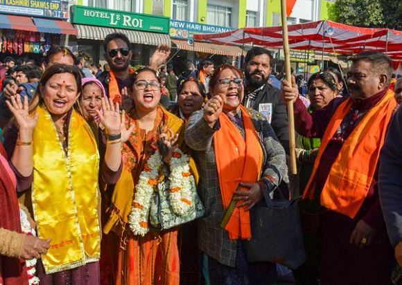 Devotees chant slogans during the departure of the first special ‘Aastha’ train for Ayodhya, at Jammu Railway station (Image/PTI)
