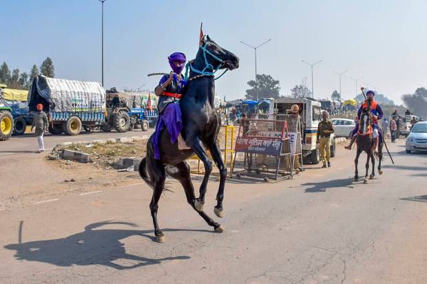 Nihangs at the Punjab-Haryana Shambhu border during farmers' 'Delhi Chalo' protest, near Patiala district. (PTI Photo)