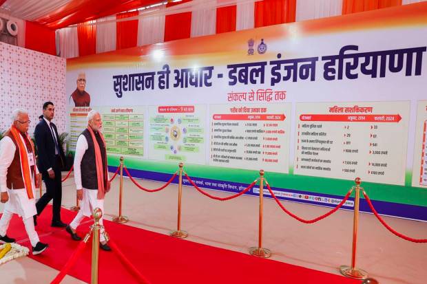 Prime Minister Narendra Modi with Haryana Chief Minister Manohar Lal and others visits an exhibition of various development projects, in Rewari district. (PTI Photo)