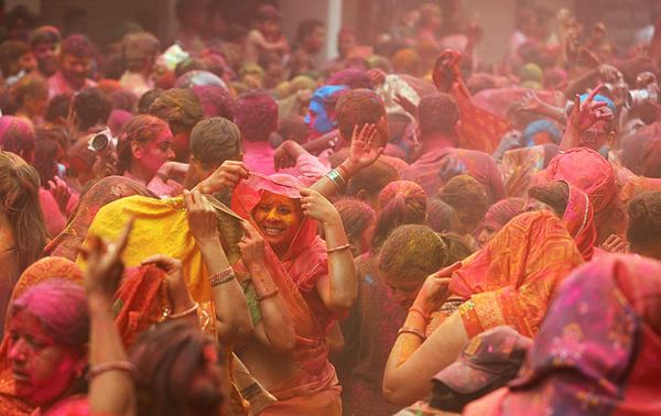People play with colours during Holi festival celebrations, in Hyderabad (PTI)