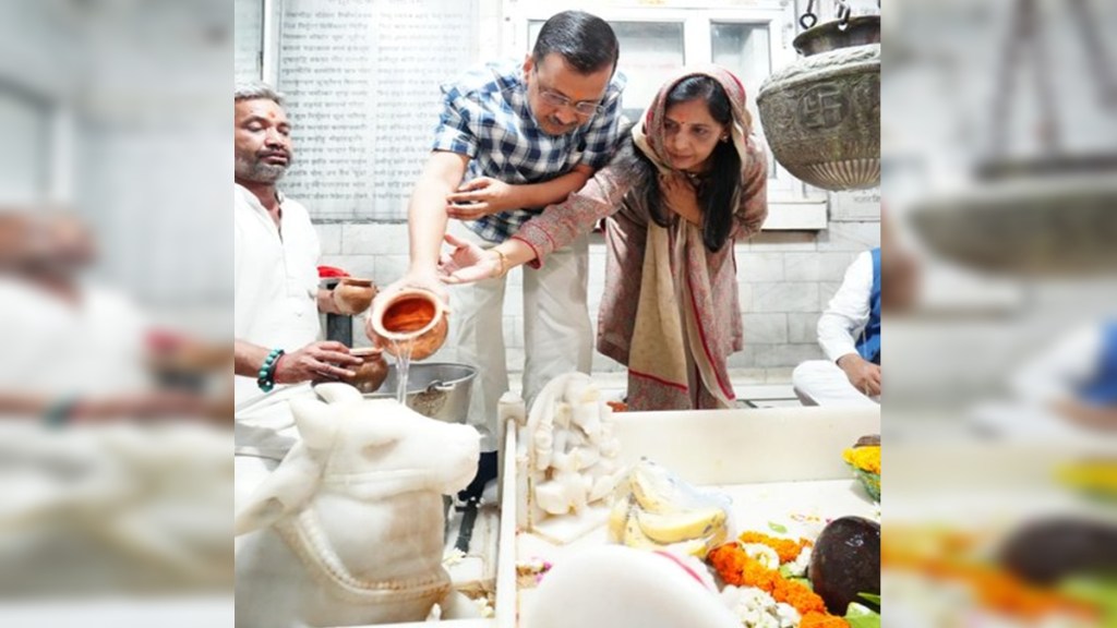 Delhi Chief Minister Arvind Kejriwal with wife Sunita Kejriwal offers prayers at Navagraha Mandir a day after he got interim bail in a money laundering case, amid Lok Sabha elections, in New Delhi, Saturday, May 11, 2024.