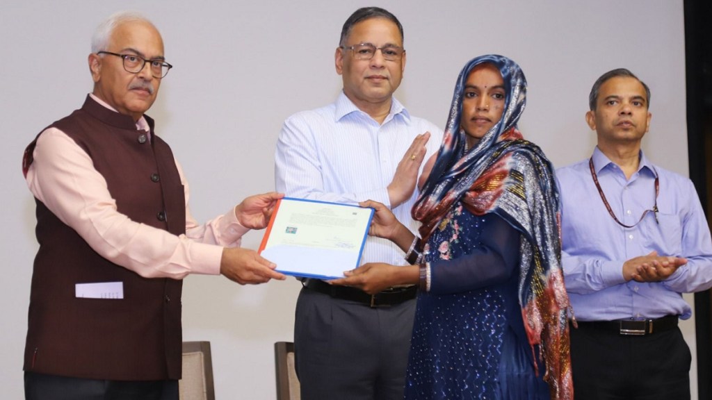 Union Home Secretary Ajay Kumar Bhalla hands over the first set of citizenship certificates under the Citizenship (Amendment) Act (CAA), in New Delhi, Wednesday, May 15, 2024. (PTI Photo)