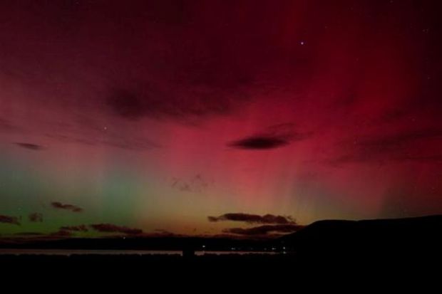 A view shows the lights of an aurora australis caused by a geomagnetic storm, in Punta Carrera, Chile. 