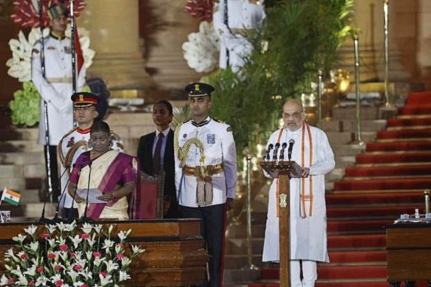 Amit Shah as he took the oath during a swearing-in ceremony at the presidential palace in New Delhi.(Photo: Reuters)