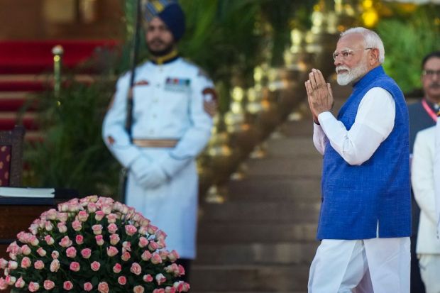 PM-designate Narendra Modi arrived greeting at the swearing-in ceremony at Rashtrapati Bhavan in New Delhi on Sunday.(Photo: PTI)