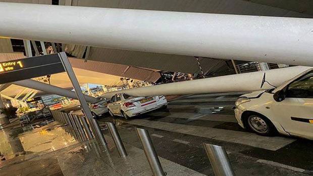 As the roof of the Delhi airport's Terminal-1 collapsed vehicles were crushed under it. (Photo source: PTI)