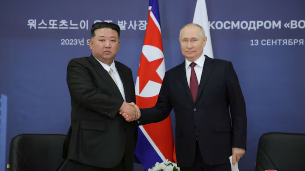 Russia's President Vladimir Putin and North Korea's leader Kim Jong Un attend a meeting
