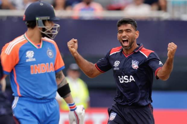 United States' Saurabh Nethralvakar, right, celebrates the dismissal of India's Virat Kohli, left, during the ICC Men's T20 World Cup cricket match between United States and India. (AP/PTI)