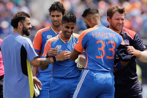 India's Suryakumar Yadav, center, celebrates with teammates after their win. (AP/PTI)