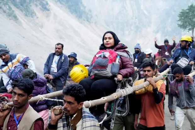 Pilgrims enroute to the holy cave shrine of Amarnath from the Baltal base camp during the annual Amarnath Yatra, in Ganderbal district. (PTI Photo)