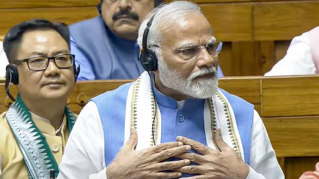 Modi takes Sholay jibe at Congress
