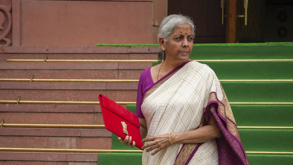 Union Finance Minister Nirmala Sitharaman with a red pouch carrying the Budget documents arrives at the Parliament to present the Union Budget 2024-25, in New Delhi, Tuesday, July 23, 2024. (PTI Photo/Atul Yadav