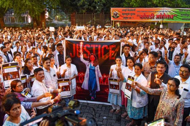 Nagpur: Doctors take part in a candle march to condemn the rape and killing of a trainee doctor at Kolkata's RG Kar Medical College. (PTI)