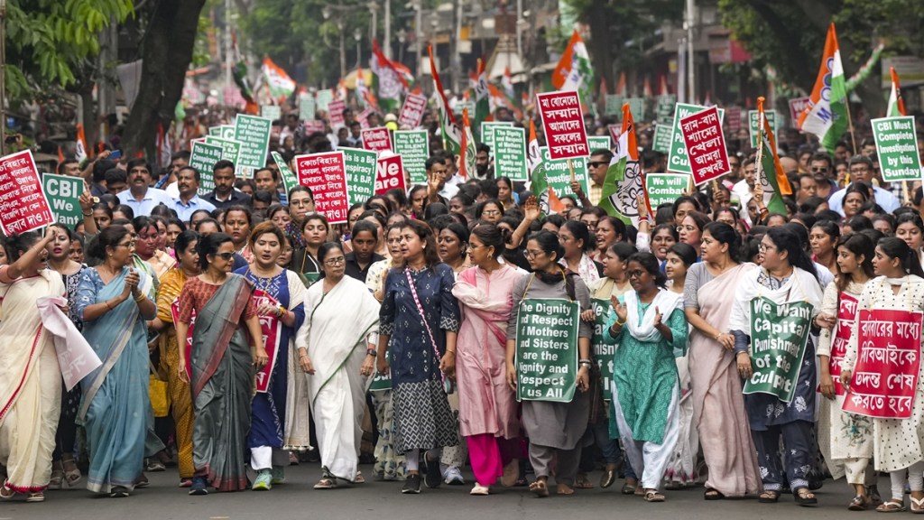 West Bengal Chief Minister and TMC chief Mamata Banerjee along with party leaders and supporters takes part in a protest rally demanding justice for a woman doctor who was allegedly raped and murdered at R G Kar Medical College and Hospital, in Kolkata, Friday, August 16, 2024. (PTI Photo/Edited)