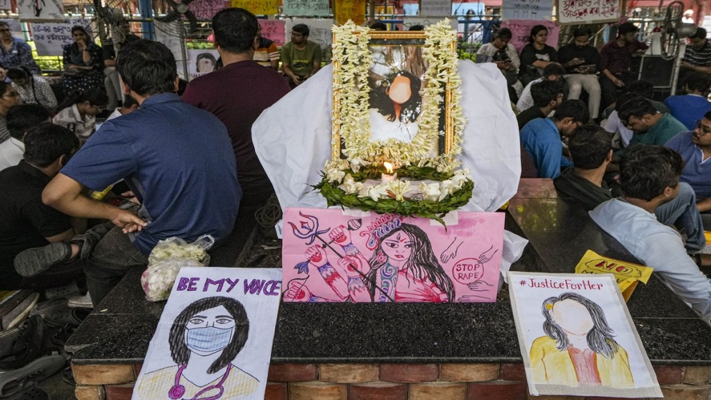 Junior doctors participate in a protest at the SSKM Hospital against the alleged rape and killing of a post graduate trainee doctor, in Kolkata, Saturday, Aug. 17, 2024. (PTI Photo/Swapan Mahapatra)