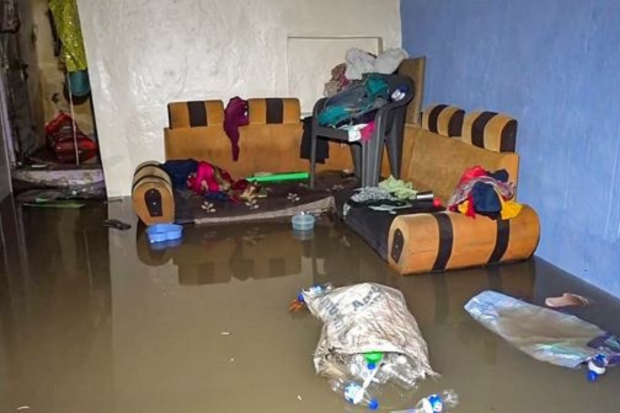 A partially submerged room of a house as flood water entered homes in low lying areas of Vadodara on Thursday (PTI Photo)