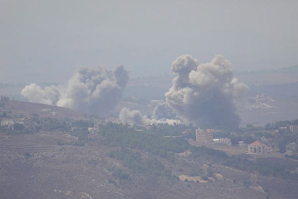 Smoke billows over southern Lebanon following Israeli strikes, amid ongoing cross-border hostilities between Hezbollah and Israeli forces, as pictured from Marjayoun, near the border with Israel, September 23, 2024. (REUTERS)