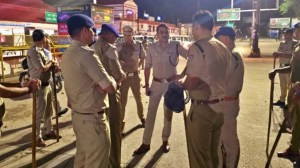 Police at the scene of the communal clash at Dehradun railway station. (Photo: IE)