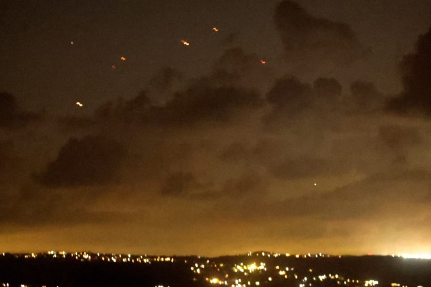 Projectiles soared through the sky on October 1, following Iran's launch of a salvo of ballistic missiles at Israel, as observed from Tyre in southern Lebanon.(Reuters) 