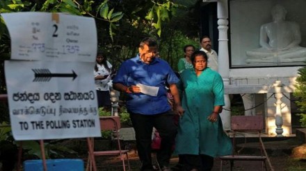 People leave a polling station after voting on the day of the parliamentary election, in Colombo, Sri Lanka, November 14, 2024. REUTERS/